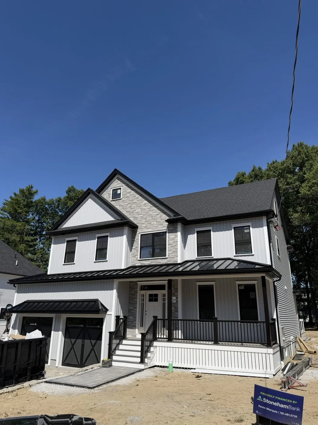New build with a dark standing seam roof